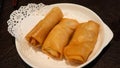 deep fried spring roll stuffed with prawns and pork on a white plate Royalty Free Stock Photo