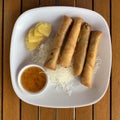 Deep Fried Thai Spring Rolls with a Dipping Sauce Royalty Free Stock Photo