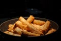deep fried spring rolls surve on the pan in dark background Royalty Free Stock Photo
