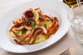 Deep fried squid tentacles with potatoes Royalty Free Stock Photo