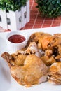 Deep fried whole chicken with banana ketchup