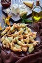 Deep fried zucchini flowers on a plate Royalty Free Stock Photo