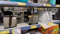 Deep fryers on the supermarket shelves. Small household appliances for the kitchen