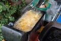 Deep frying French Fries in deep fryer Royalty Free Stock Photo