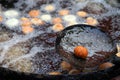 Deep frying medu vada in the pan. Medu Vada is a savoury snack from South India, very common street food in the India.