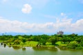 The Leisurely and Beautiful Pathway along the Verdant Green Lake and Vivid Forest