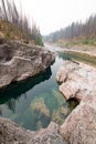 Deep Green Pool of still water in Meadow Creek Gorge in the Bob Marshall Wilderness area in Montana USA Royalty Free Stock Photo