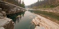 Deep Green Pool of still water in Meadow Creek Gorge in the Bob Marshall Wilderness area in Montana USA