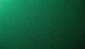 Deep green textured surface, possibly paper or fabric, with subtle intersecting lines creating repeating pattern. Close-up macro Royalty Free Stock Photo