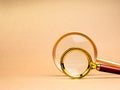 Deep insights, learnings, data and information searching, finding complex problem concept. Two sizes of empty magnifying glasses Royalty Free Stock Photo