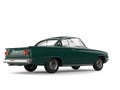 Deep jungle green vintage car restored - rear view Royalty Free Stock Photo