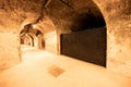 Deep and long undergrounds caves for making champagne sparkling wine from chardonnay and pinor noir grapes in Reims, Champagne,