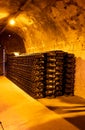Deep and long undergrounds caves for making champagne sparkling wine from chardonnay and pinor noir grapes in Reims, Champagne,