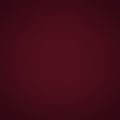 A deep maroon-colored background with a subtle gradient effect, transitioning smooth Royalty Free Stock Photo