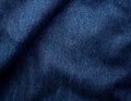 Deep Navy Blue Denim Fabric Texture with a Smooth, Worn Surface for Sophisticated Backgrounds Royalty Free Stock Photo