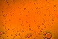 deep orange background liquid of bubbles