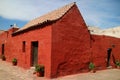 Deep orange red colored building in Santa Catalina Monastery, UNESCO world heritage site in Arequipa, Peru Royalty Free Stock Photo