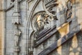 Deep perspective through the gothic arches of the cathedral Duomo di Milano. Royalty Free Stock Photo