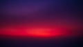 Deep purple and vibrant red abstract gradient with a blurred horizon effect and dark moody atmosphere Royalty Free Stock Photo