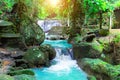 Deep rain forest jungle waterfall at Erawan waterfall National Park Kanchanaburi in Thailand Royalty Free Stock Photo