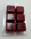 Deep Red burgundy palm wax sent cubes white background