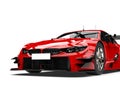 Deep red modern super race car - front view closeup shot Royalty Free Stock Photo