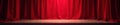 Deep red stage drapes, single spotlight on bare boards , mood, background, theater Royalty Free Stock Photo