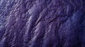 A close-up of a purple leather background