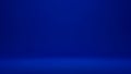 Deep Royal Blue Studio Background with Subtle Floor Gradient and Soft Lighting Effects Keywords: blue, background Royalty Free Stock Photo