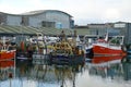 Moored trawlers and fishing equipment. Sutton Harbour Plymouth England