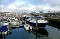 Moored trawlers and fishing equipment. Sutton Harbour Plymouth England