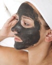 Deep sea mud mask treatment Royalty Free Stock Photo