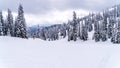 Deep snow pack in the high alpine on ski runs at the village of Sun Peaks, British Columbia, Canada Royalty Free Stock Photo