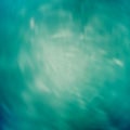 Deep teal background with blurred effect