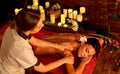 Deep tissue massage treatment in Ayurveda of woman in spa salon. Royalty Free Stock Photo