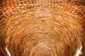 Deep well of books stacked in layers in a huge wall of knowledge Royalty Free Stock Photo