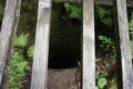 A deep well for water carved into the rock.