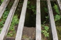 A deep well for water carved into the rock.