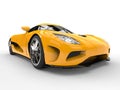 Deep yellow futuristic sport concept car - headlight closeup shot