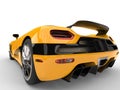 Deep yellow futuristic sport concept car - taillight closeup shot