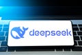 Deepseek logo icon on mobile phone monitor. Chinese artificial intelligence software company.