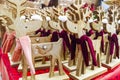 Deer animal toys for sale in a souvenir shop. Traditional wooden toys deer. Christmas wooden animal toys. Christmas market