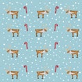 Deer and cane candy pattern on blue background Royalty Free Stock Photo