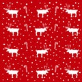 Deer and cane candy pattern on red background Royalty Free Stock Photo