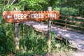 The Deer Creek Trail sign in Frick Park, Pittsburgh, Pennsylvania, USA Royalty Free Stock Photo