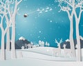 Deer family in winter season with urban city landscape on paper art background Royalty Free Stock Photo