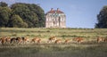 Deer in front of Hermitage Hunting Lodge in Dyrehaven, Denmark Royalty Free Stock Photo