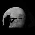 Deer hunter and full moon Royalty Free Stock Photo