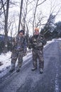 Deer hunters with guns