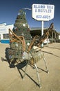 Deer made out of mufflers & stack of tires at Alamo Tires & Muffler in Alamogordo, southern New Mexico off route 54